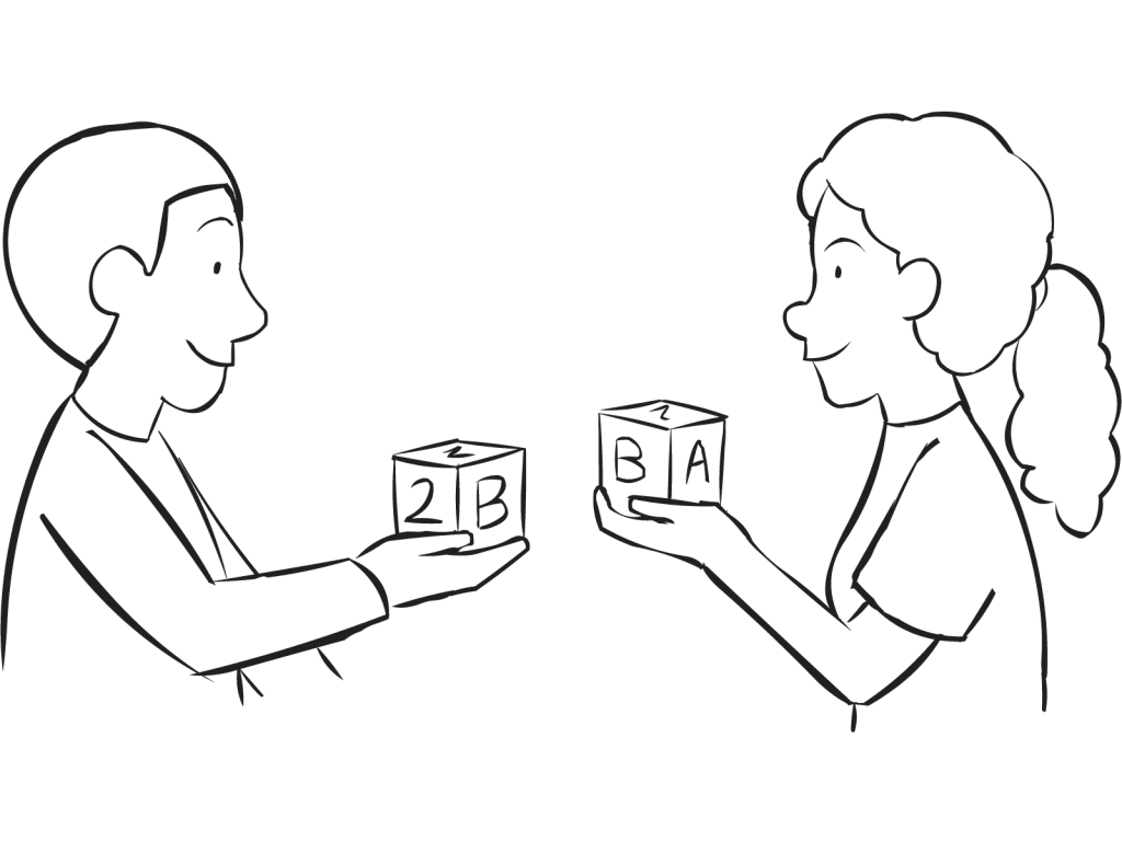 Two people showing a wooden block they are holding and sharing as part of fun ice-breaker called Mingle and Match